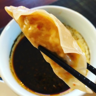 Steamed dumpling with dipping sauce